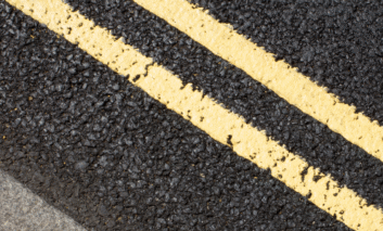 Double Yellow Lines on a tarmac road