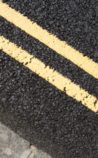 Double Yellow Lines on a tarmac road