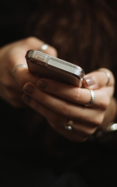 Woman viewing a survey on a mobile phone