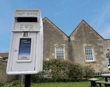 The letters to heaven post box situated in the Friend’s Garden photographed against the old chapel.