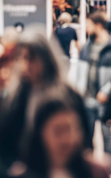 People walking around an exhibition