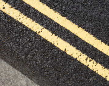 Double Yellow Lines on a tarmac road