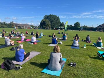 Yoga outdoors in King George V Playing Fields